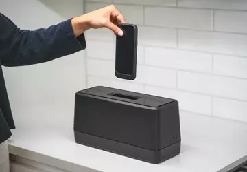 Het Swippitt-oplaadsysteem laadt je iPhone in ...