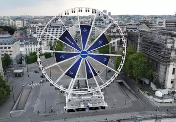 Je kunt gratis op het reuzenrad ...