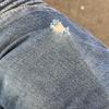 Samsung Galaxy S24 Ultra, gescheurde jeans